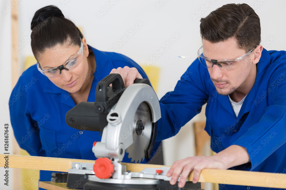 apprentice carpenters at work