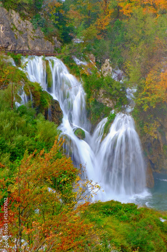 Waterfall the Plitvice Lakes at autumn