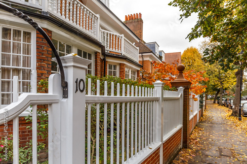 Chiswick suburb street in autumn, London photo