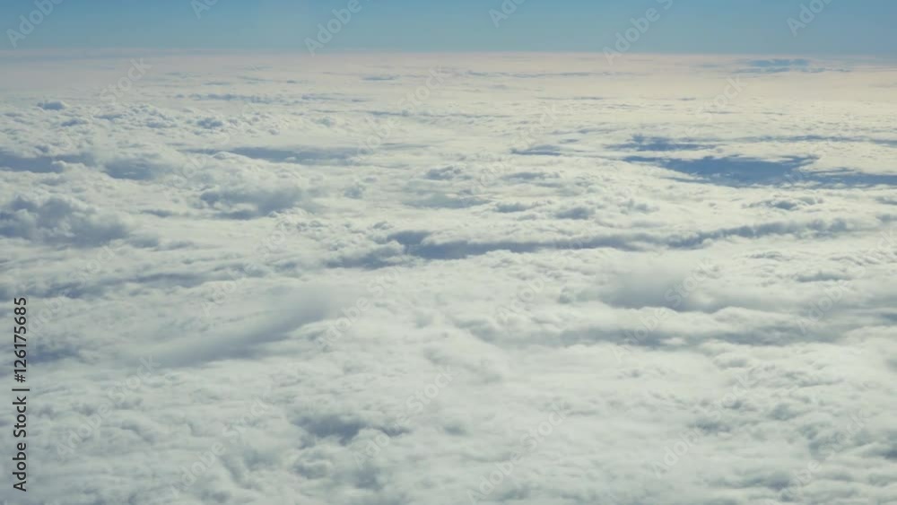 Traveling by air. View through an airplane window. Full high definition video
Traveling by air. View through an airplane window. Full high definition video