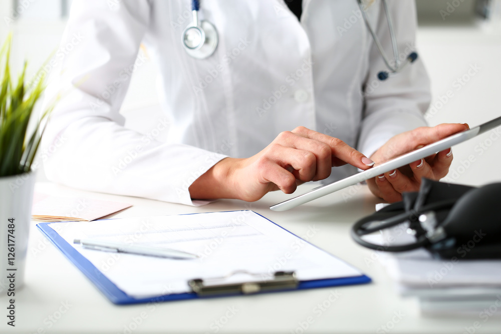 Female doctor hold digital tablet pc Female doctor hold digital tablet pc
