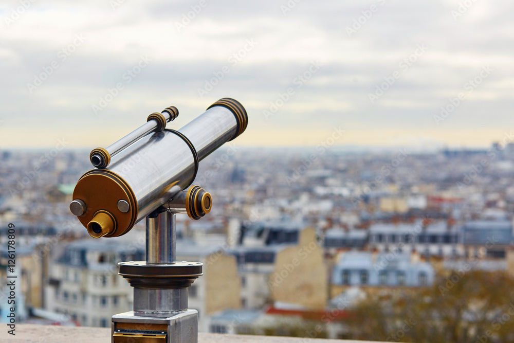 Touristic telescope overlooking Montmartre Touristic telescope overlooking Montmartre