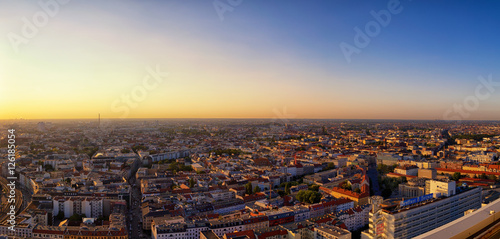 Berlin. Germany - September 2016: Beautiful panoramic aerial view over northern Berlin with romantic colorful sunset and Tegel Airport in background.