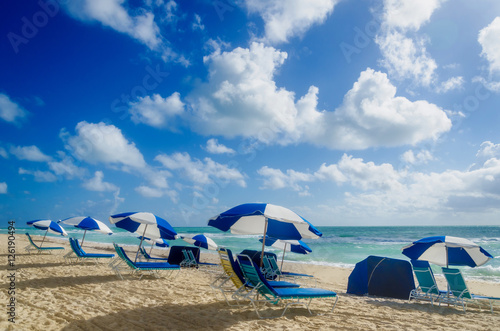 Beach umbrellas at morning Miami beach