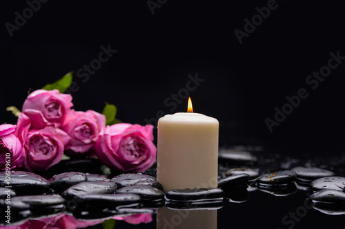 Still life with set of rose with candle and therapy stones 