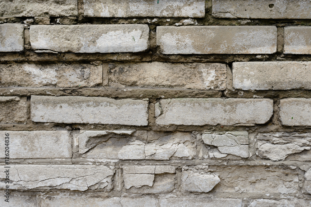 Fototapeta premium Brick texture with scratches and cracks