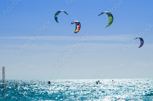 Kitesurfers on the sea in Calpe Spain photo