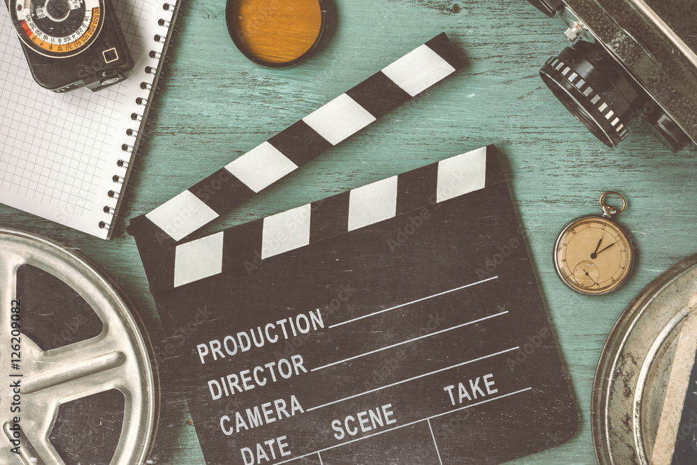Fototapeta premium Clapperboard and a film reel