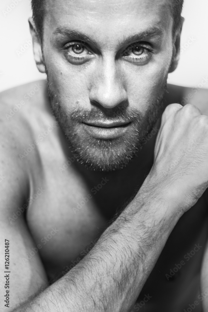 Muscular male bodybuilder on white background Muscular male bodybuilder on white background