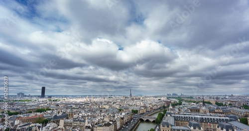 Eiffel and Montparnasse towers over Paris, cloudy day