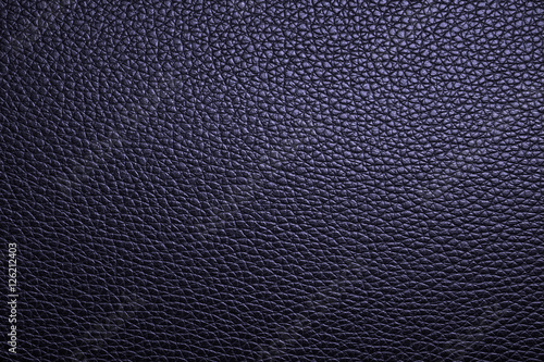 Deep blue leather texture or leather background from natural leather sheet for design with copy space for text or image. Closeup detail on leather texture background. Dark edged.