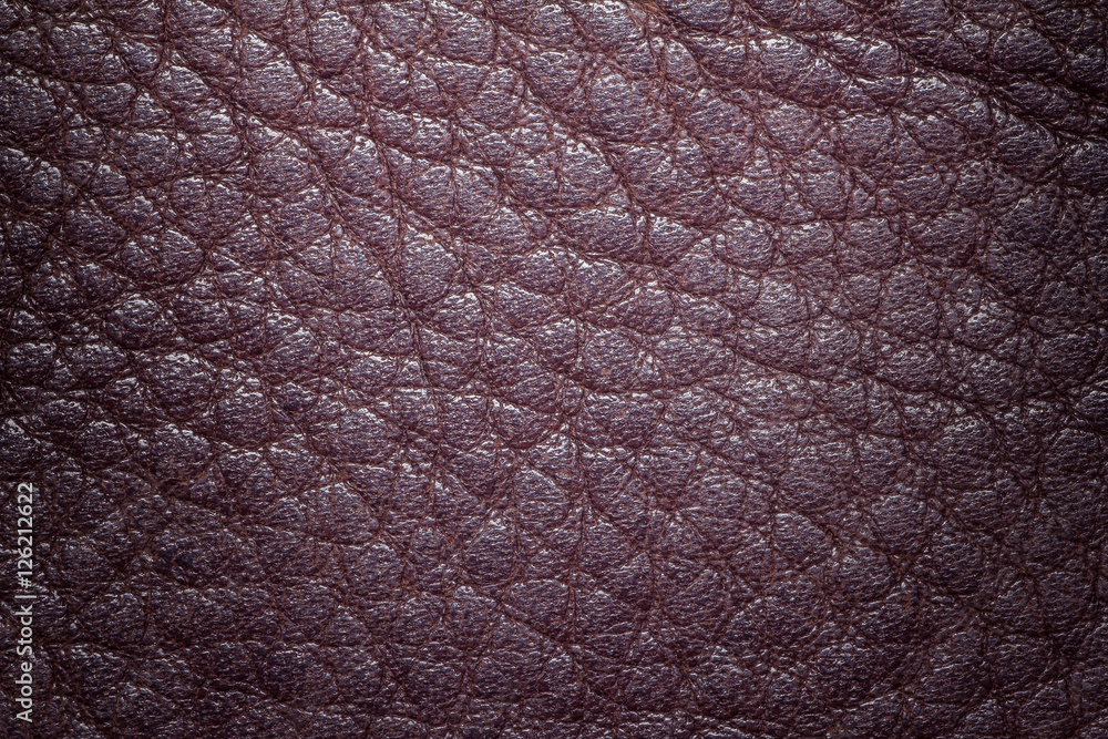 Red brown leather texture or leather background from natural leather sheet for design with copy space for text or image. Closeup detail on leather texture background. Dark edged. Red brown leather texture or leather background from natural leather sheet for design with copy space for text or image. Closeup detail on leather texture background. Dark edged.