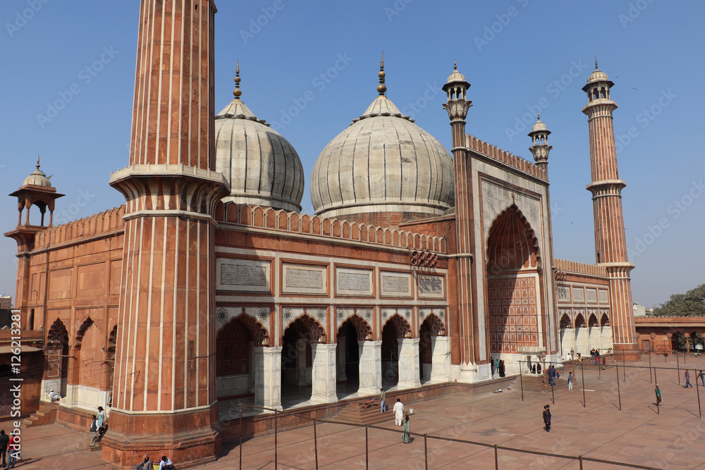 Naklejka premium Jama Masjid of Delhi, is one of the largest mosques in India. Unidentified people walk in courtyard of Jama Masjid located in Old Delhi, India. 