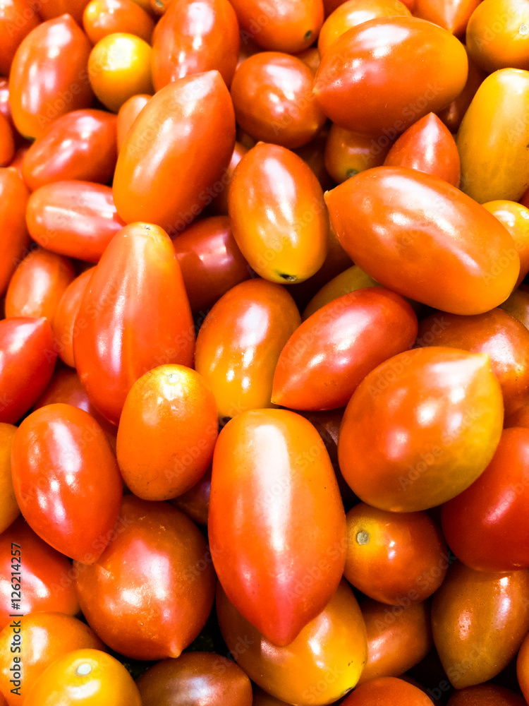 Cherry tomato. Red tomato. Texture and background. Cherry tomato. Red tomato. Texture and background.