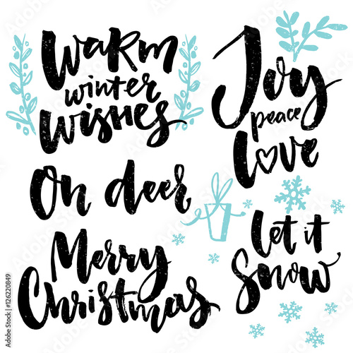 Merry Christmas type and seasonal greetings. Handwritten words for greeting cards posters and gift tags. Christmas wishes set: warm winter wishes, joy, peace and love, oh deer