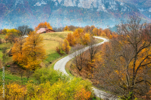 Autumn landscape / Amazing day view with a little house among the autumn forest in Balkan Mountains, Bulgaria