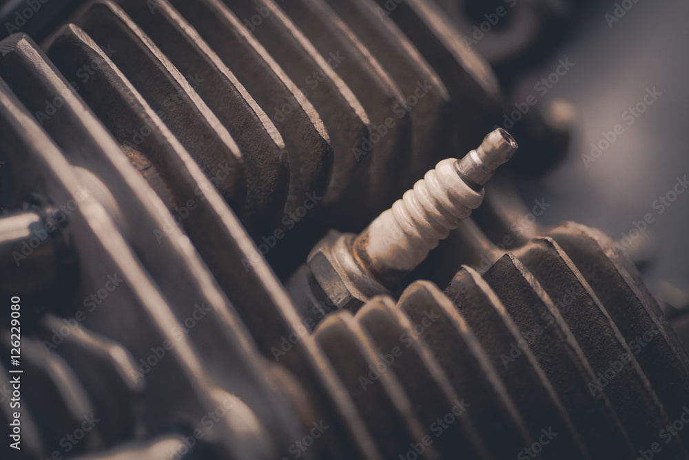 Naklejka premium Motorcycle cylinder and spark plug detail