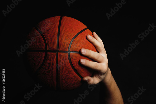 Basketball ball in male hands © master1305