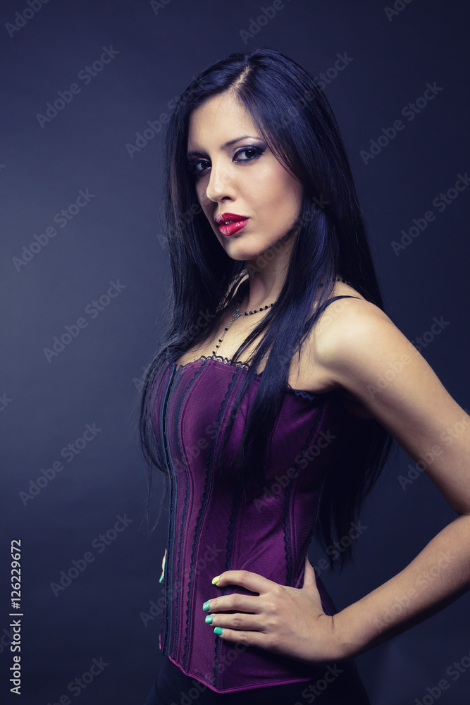 Naklejka premium portrait of young brunette woman in bad mood