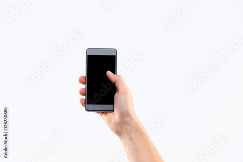 Human hand holding blank large mobile smart phone