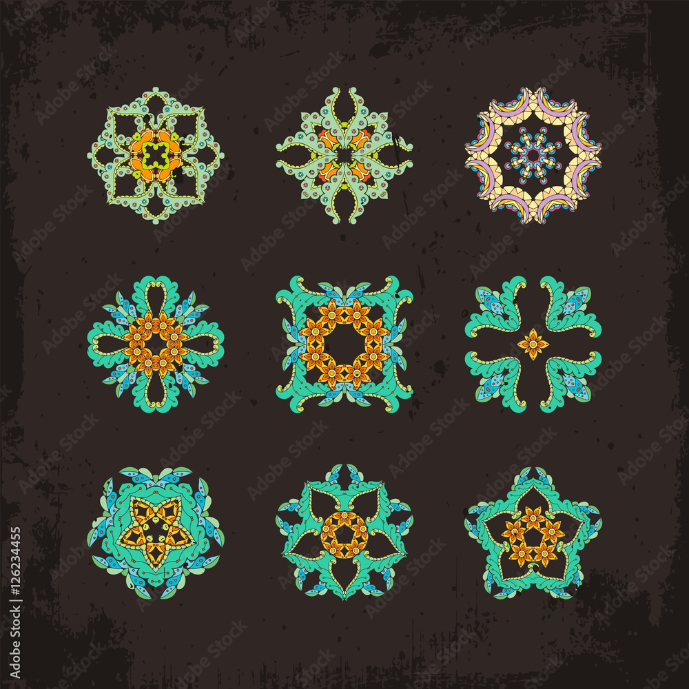 Set of ornate vector mandala symbols. Mehndi lace tattoo. Oriental weave. Set of ornate vector mandala symbols. Mehndi lace tattoo. Oriental weave.