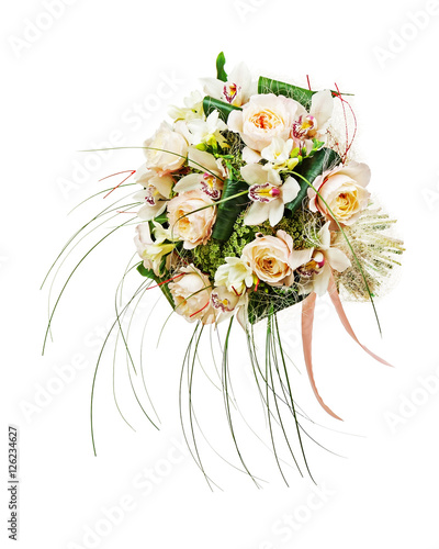 Flower arrangement of peon flowers and orchids isolated on white background. Closeup.