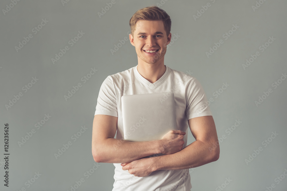 Handsome guy with gadget Handsome guy with gadget