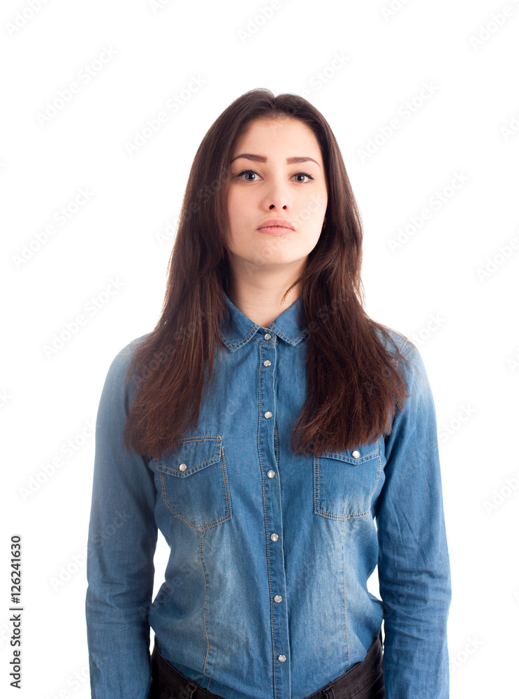 Brunette girl in jeans shirt isolated Brunette girl in jeans shirt isolated