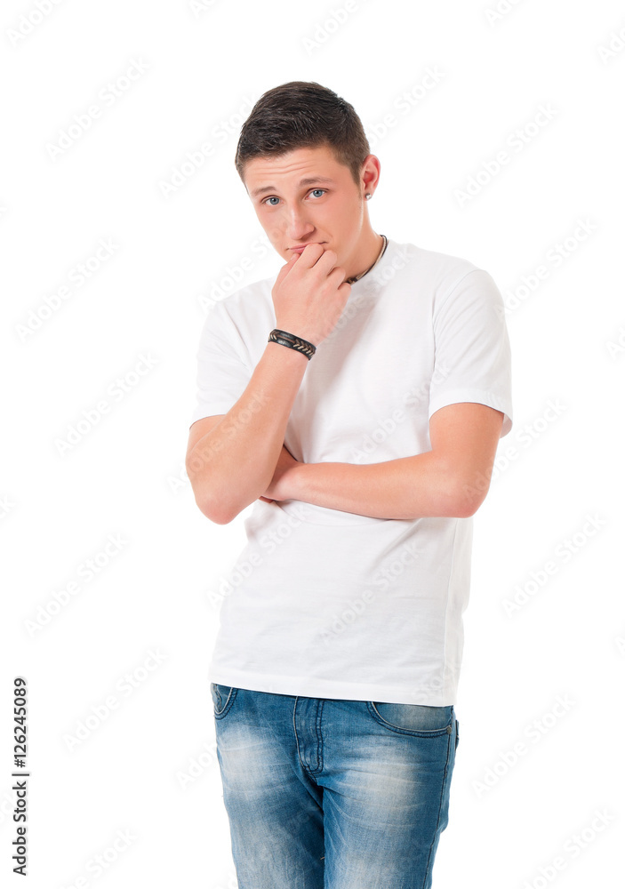 Portrait of handsome young thoughtful man isolated on white background. Portrait of a smart serious handsome ponder teen boy. Portrait of casual thinking guy - caucasian male model. Portrait of handsome young thoughtful man isolated on white background. Portrait of a smart serious handsome ponder teen boy. Portrait of casual thinking guy - caucasian male model.