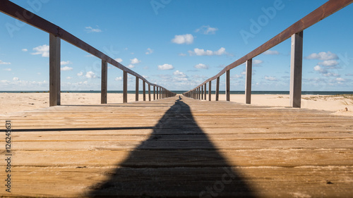 Wooden walkway to the Atlantic Ocean, Ovar, Portugal photo