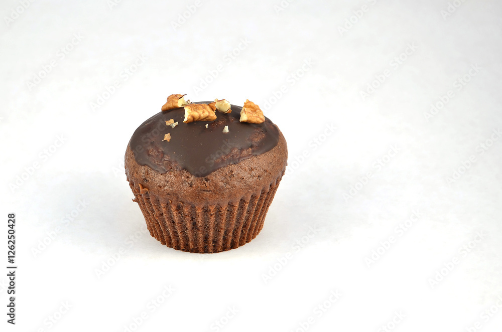 one chocolate brown muffin or cupcake isolated photo one chocolate brown muffin or cupcake isolated photo