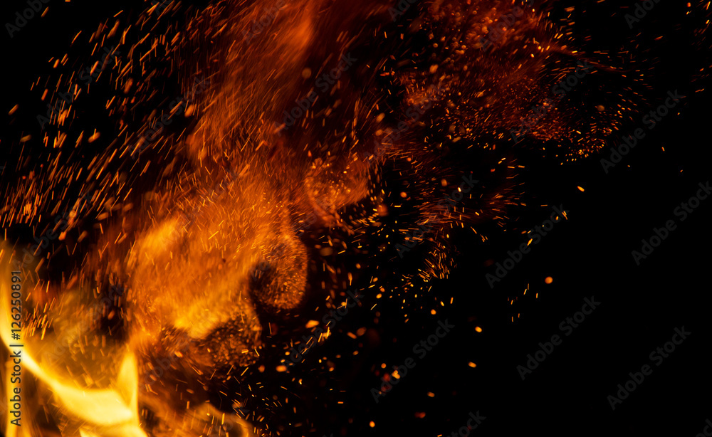 fire flames with sparks on a black background Stock Photo | Adobe Stock