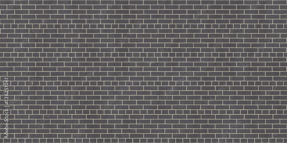 Naklejka premium Background texture of dark gray brick wall