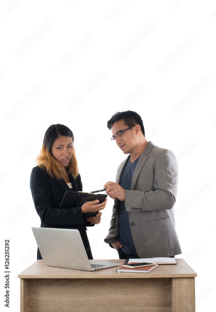 Young business woman standing with her boss conversation about t Young business woman standing with her boss conversation about t