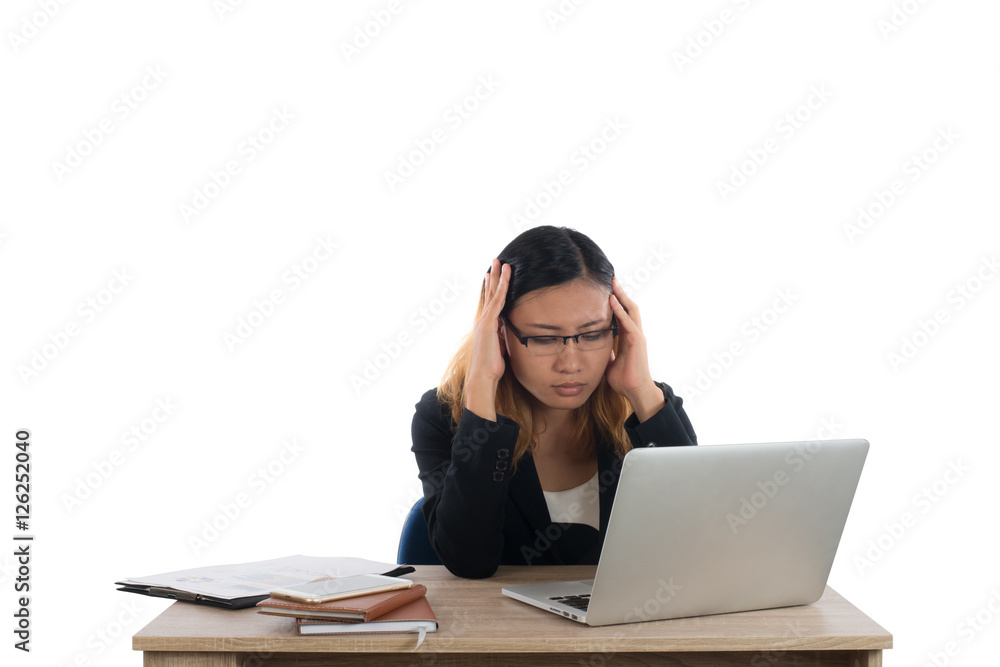 Stressed young business woman at the desk with a laptop isolated Stressed young business woman at the desk with a laptop isolated
