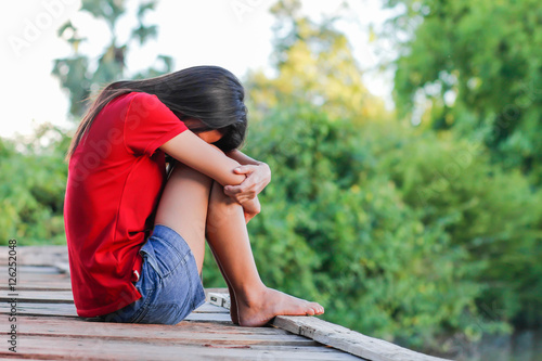 girl sad on the bridge
