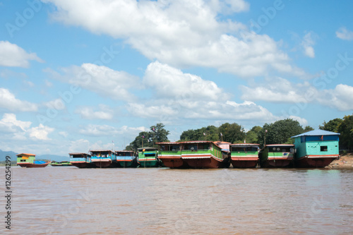 Wallpaper Mural Boats park on Ban Ton Phung dock,Laos Torontodigital.ca