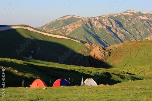 Campground in the mountains in summer photo