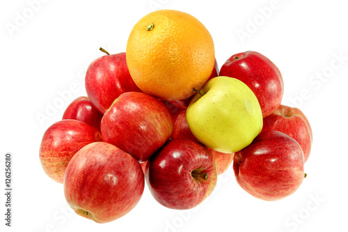 one large orange and red apples