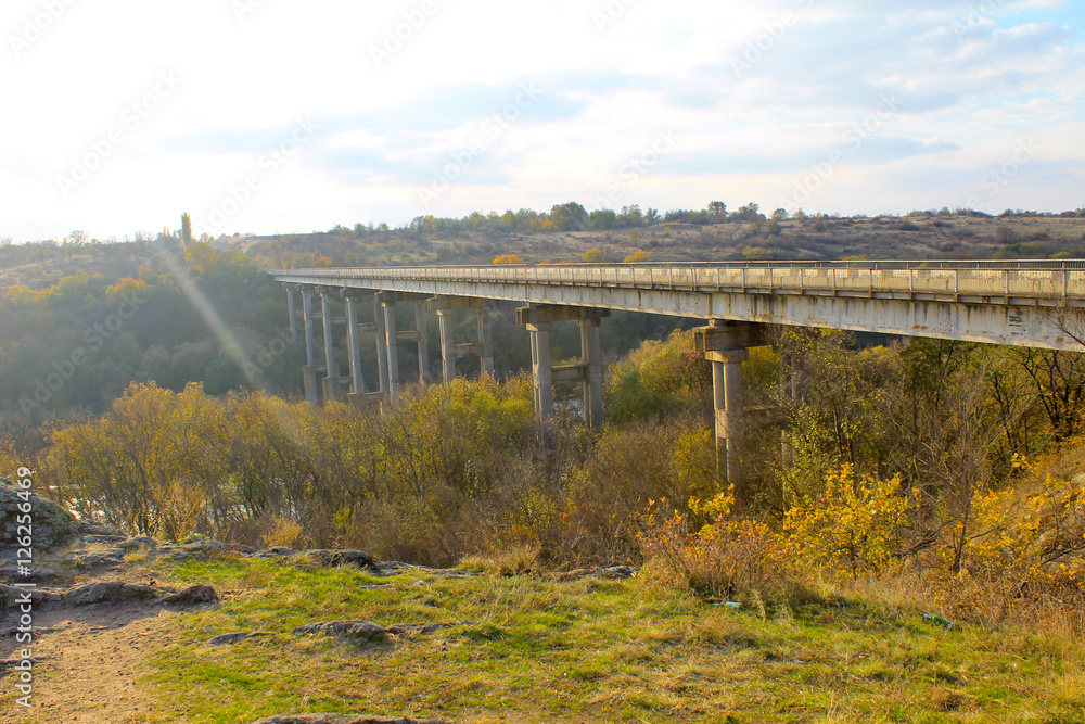 Bridge across the river Southern Bug in Ukraine on autumn Bridge across the river Southern Bug in Ukraine on autumn