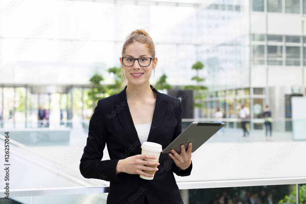 Businesswoman using a Tablet pc Businesswoman using a Tablet pc