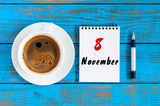 November 8th. Day 8 of month, cappuccino cup with calendar on journalist workplace background. Autumn time. Empty space for text