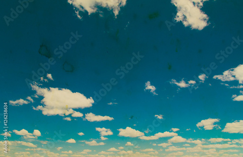 Retro sky and clouds background.