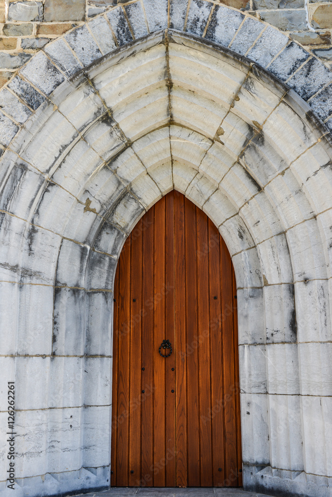 Wooden Door and archway of medieval Church 