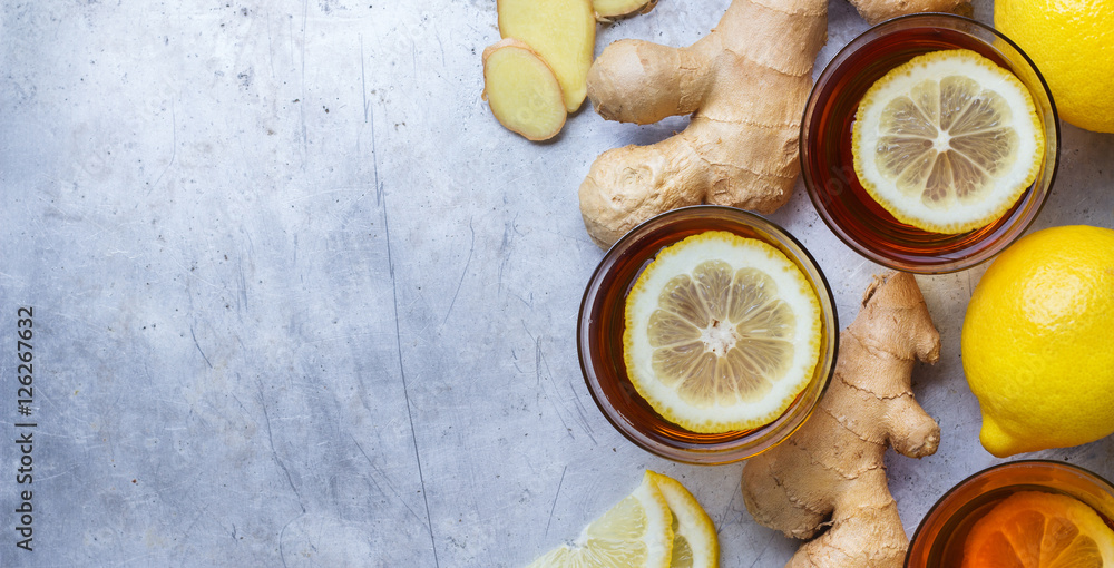 Ginger tea in a glass for flu cold winter days Ginger tea in a glass for flu cold winter days