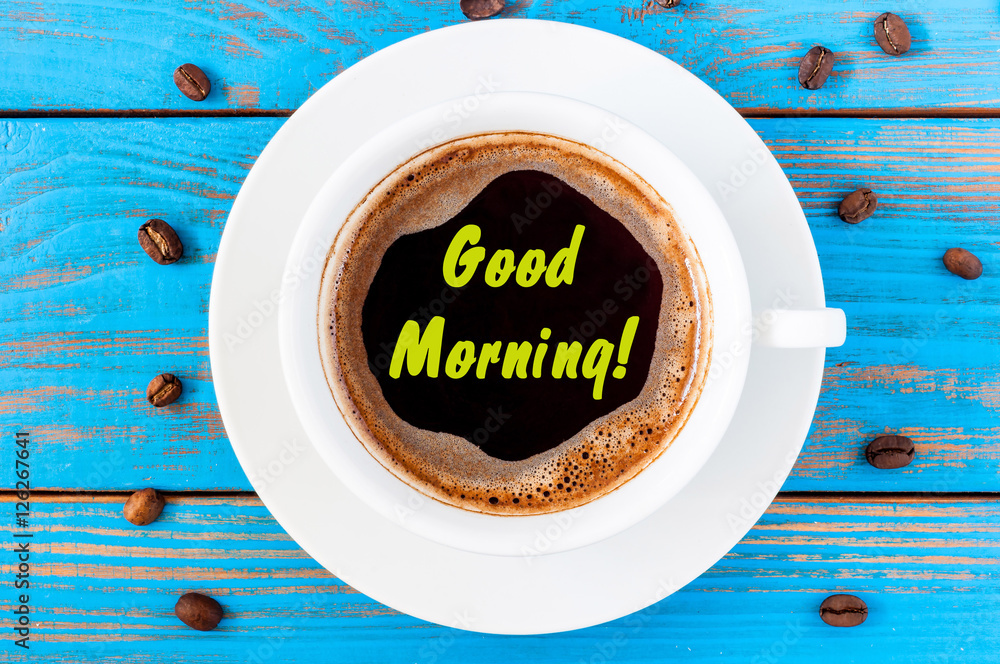 Φωτογραφία Good Morning - inspiration wishes on coffee cup at blue wooden background