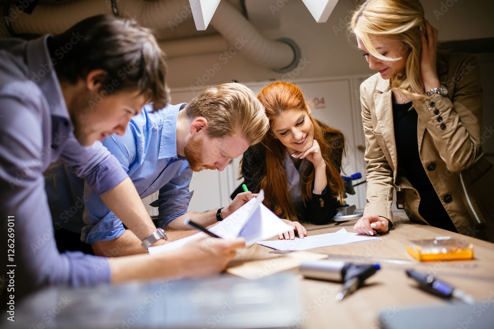 Group of creative designers brainstorming Group of creative designers brainstorming