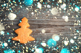 gingerbread in  form of fir on the old wooden background, christ