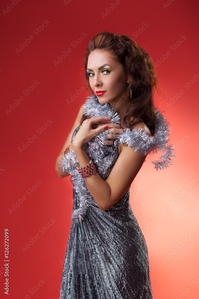 Fashion photo of beautiful sensual woman with long dark hair in luxurious dress Fashion photo of beautiful sensual woman with long dark hair in luxurious dress
