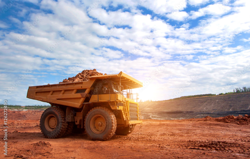 big yellow mining truck at work site